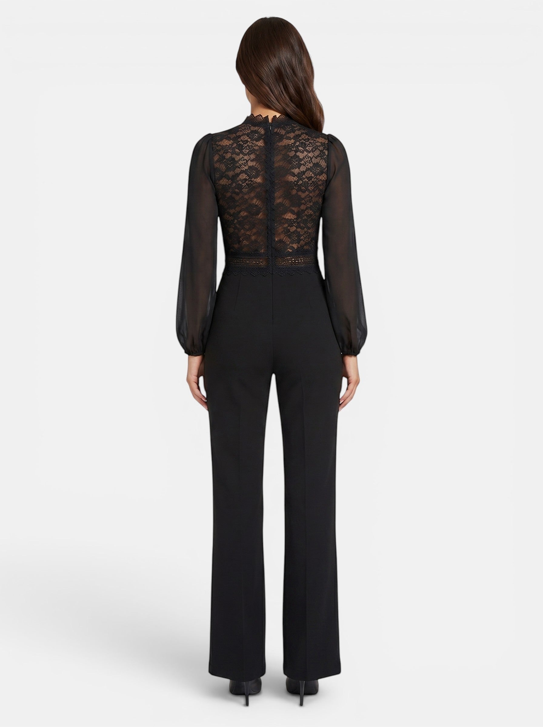 Venatte black crochet lace mesh jumpsuit with long sheer sleeves and flared legs. Elegant evening wear.