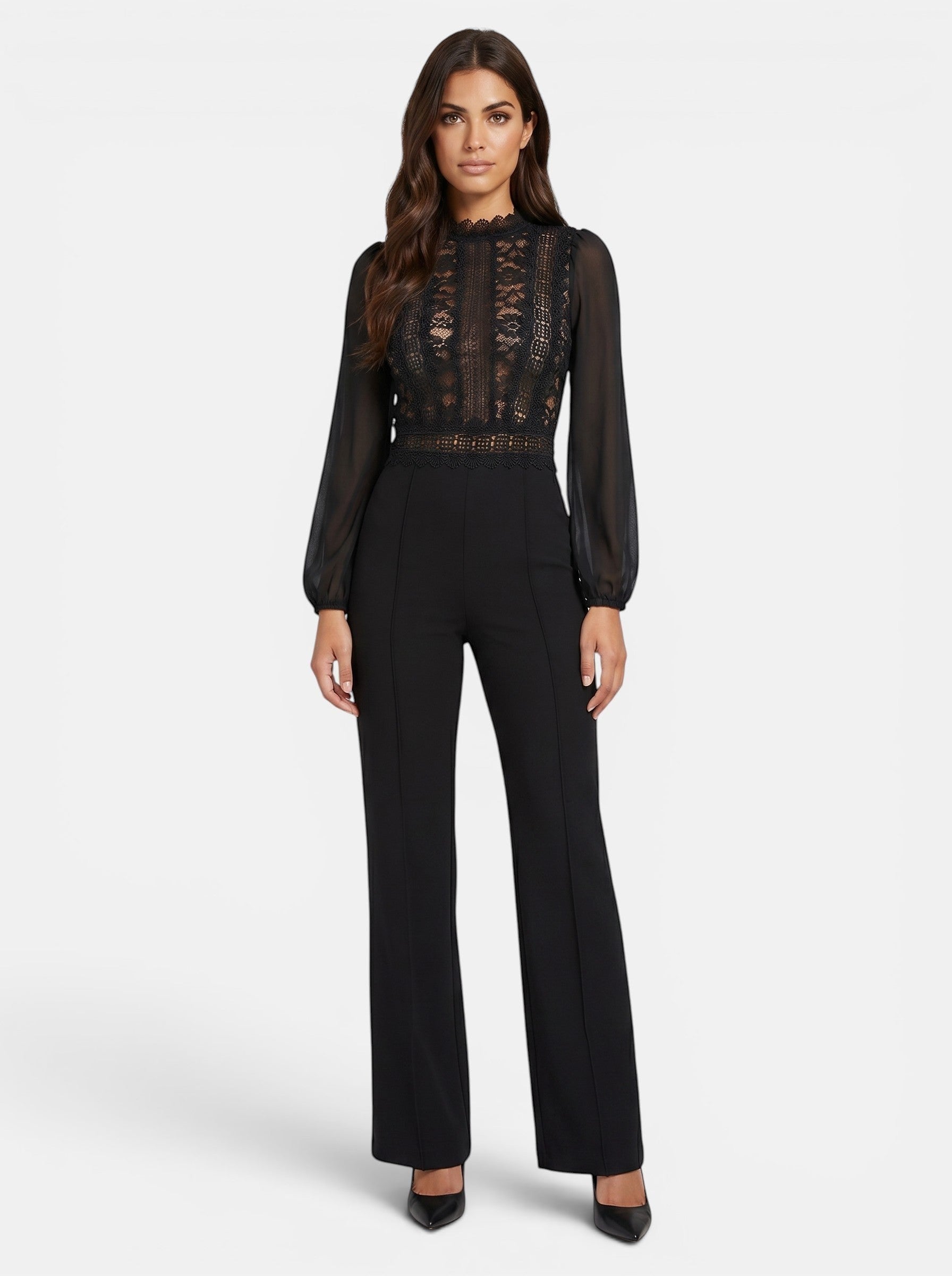 Venatte black crochet lace mesh jumpsuit with long sheer sleeves and flared legs. Elegant evening wear.