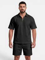 Venatte men's black quilted polyester short-sleeve polo shirt and shorts set with quarter-zip closure.