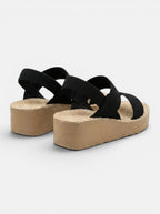 Venatte women's black elastic strap slingback wedge sandals with espadrille platform sole.