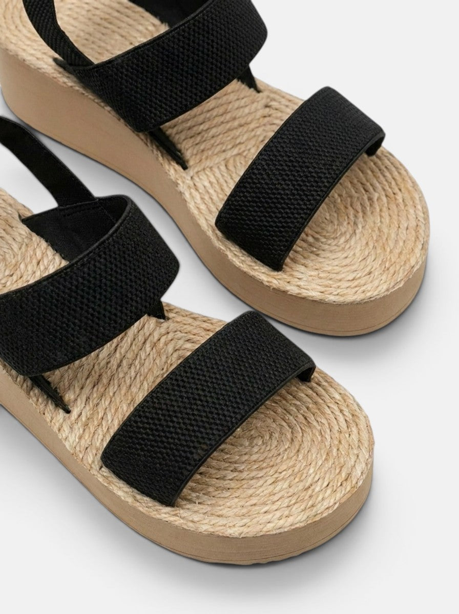 Venatte women's black slingback wedge sandals with espadrille sole and faux leather straps.