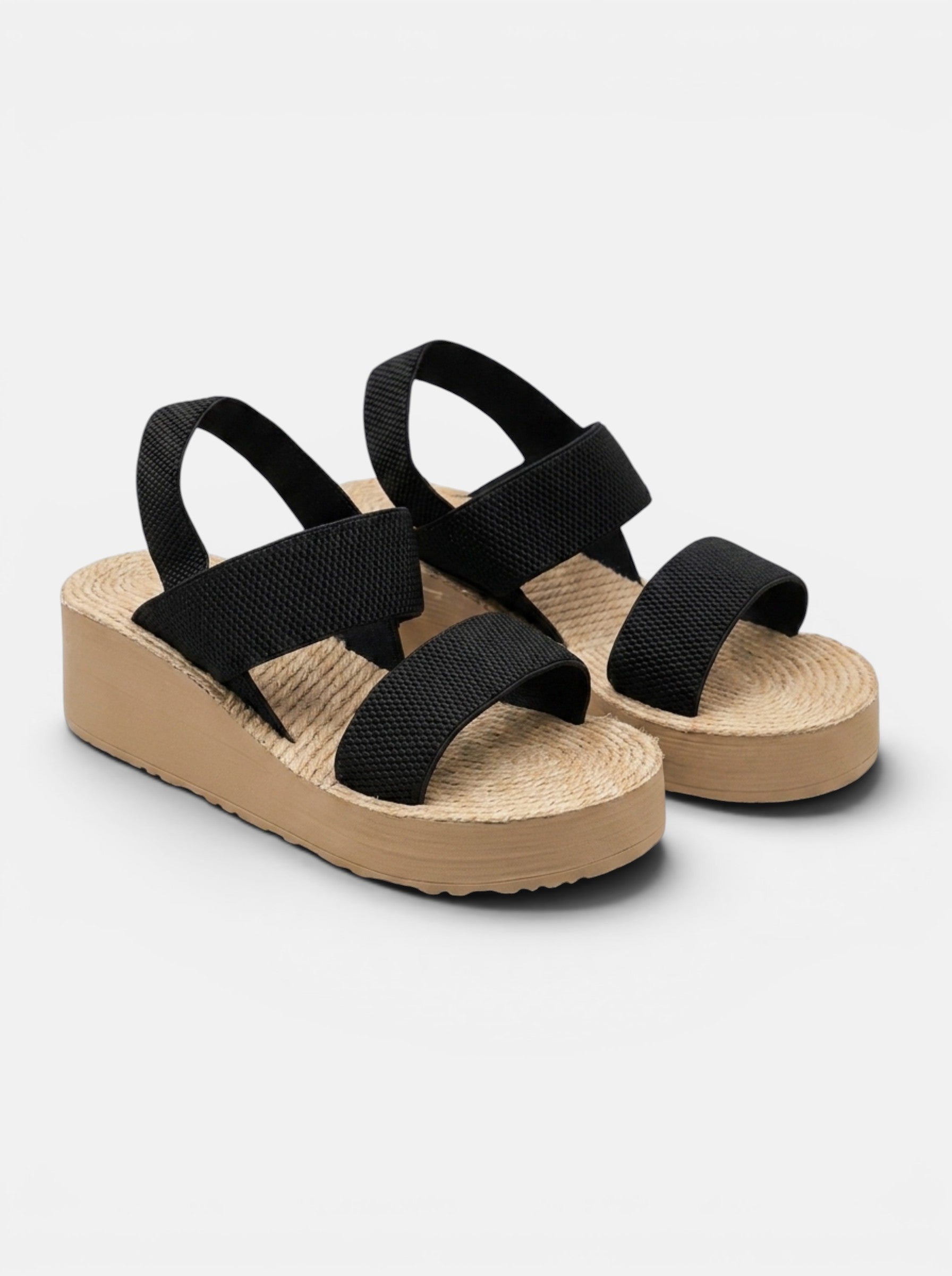 Venatte black faux leather slingback wedge sandals with espadrille sole and cushioned footbed.