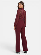 Venatte women's burgundy long sleeve jumpsuit with crochet lace mesh back and high neck. Polyester blend.