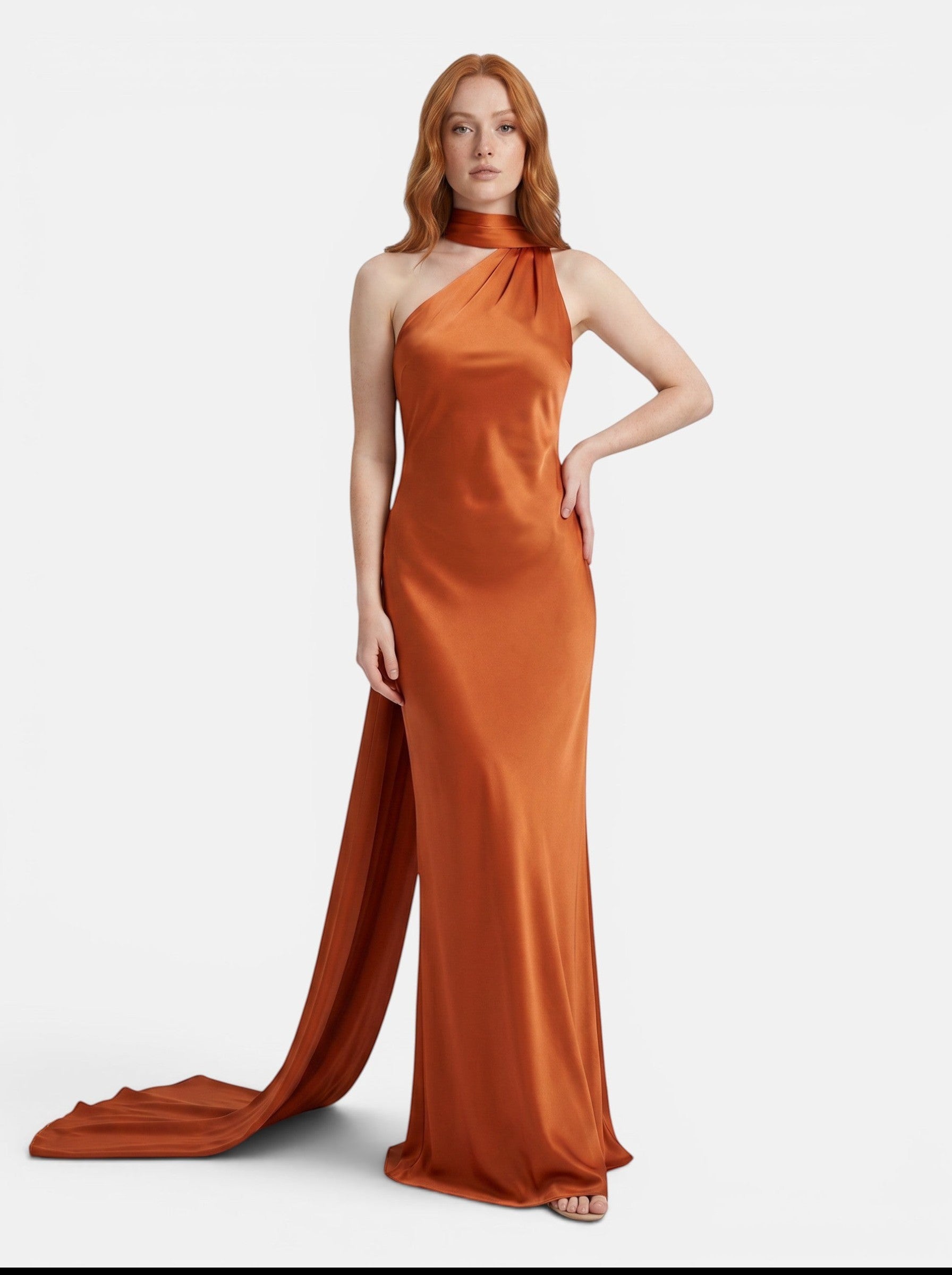 Venatte burnt orange satin style halter party dress with a backless silhouette and flowing train.