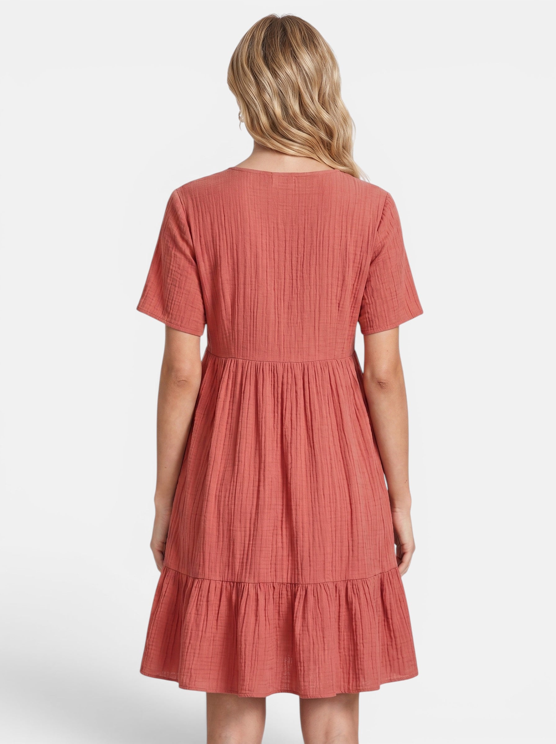 Venatte women's coral gauze mini dress with V-neck, short sleeves, and tiered ruffle hem. Bohemian style.
