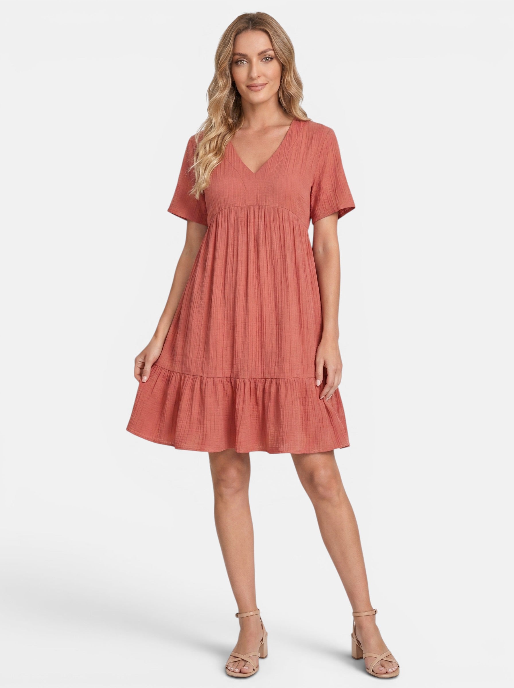 Venatte women's coral pink ruffled V-neck mini dress made of lightweight polyester blend fabric.