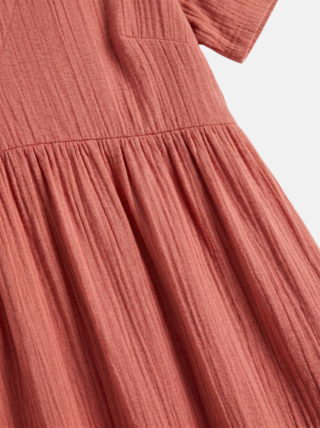 Venatte women's coral pink ruffled mini dress with V-neck and A-line silhouette, made of soft polyester blend.