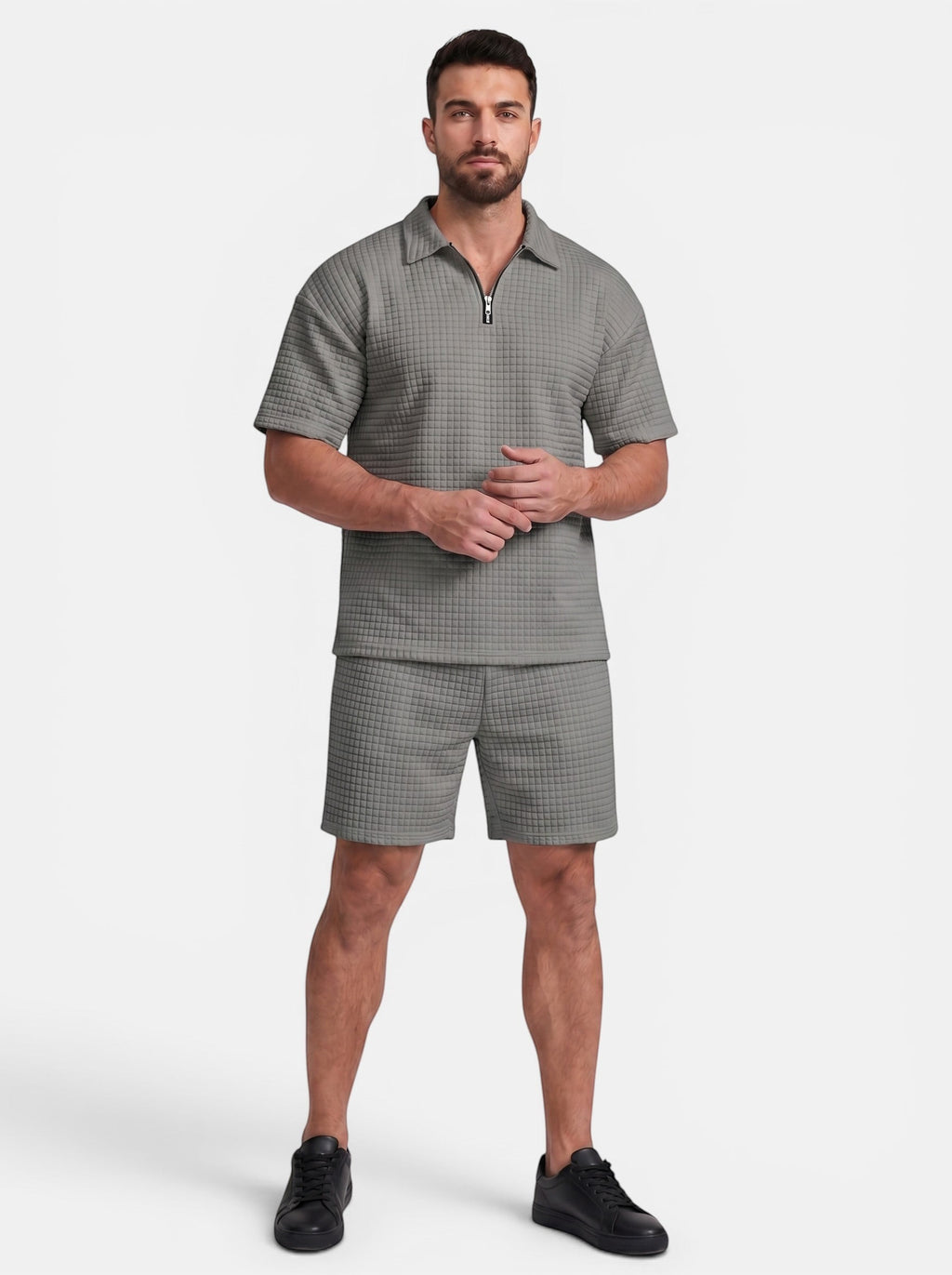 Venatte men's grey quilted polyester short-sleeve polo shirt and shorts set with quarter-zip closure.