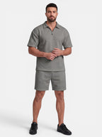 Venatte men's grey quilted polyester short-sleeve polo shirt and shorts set with quarter-zip closure.