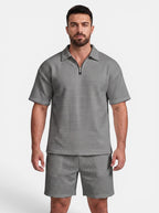 Venatte men's grey quilted polyester short-sleeve polo shirt and shorts set with quarter-zip closure.