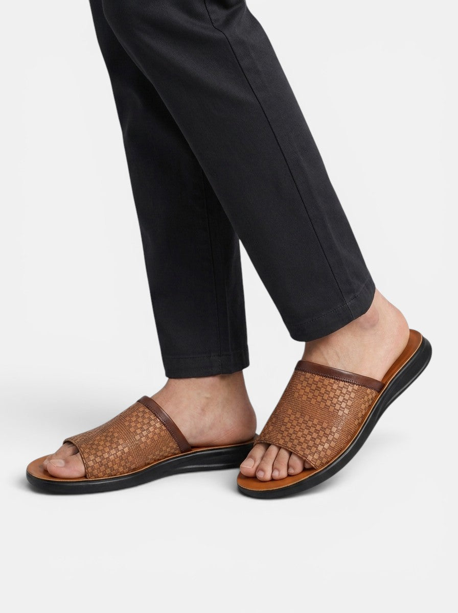 Venatte men's brown woven faux leather slip-on sandals with a minimalist design and cushioned sole.