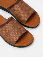 Venatte men's brown faux leather slip-on sandals with woven texture and cushioned sole.