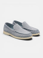 Venatte men's light blue faux suede slip-on loafers with a cream rubber sole. Casual driving moccasin style.