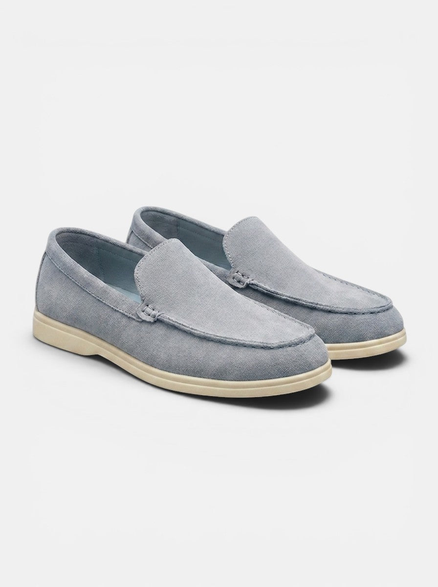 Venatte men's light blue faux suede slip-on loafers with a cream rubber sole. Casual driving moccasin style.