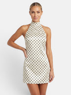 Venatte women's cream and black polka dot halter mini dress with a backless design and lace-up back.