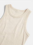 Venatte cream ribbed bodycon mini dress, sleeveless, made from a soft polyester blend with stretch.