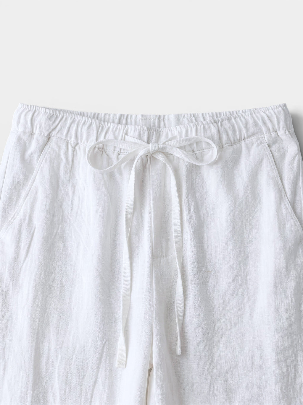 Venatte white cotton linen relaxed fit wide-leg casual pants with drawstring waist and back pocket.