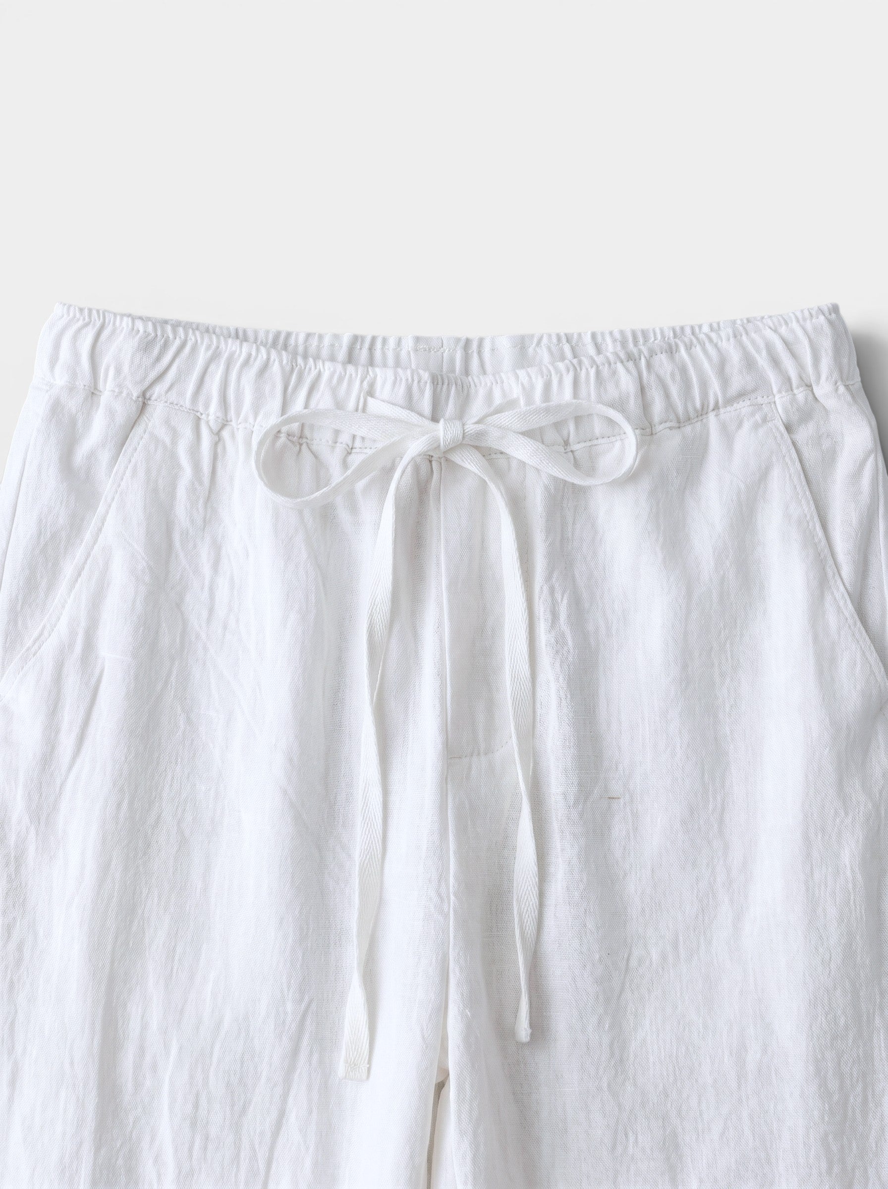 Venatte white cotton linen relaxed fit wide-leg casual pants with drawstring waist and back pocket.