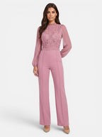 Venatte women's dusty rose crochet lace mesh jumpsuit with long sleeves and flared legs. Elegant evening wear.