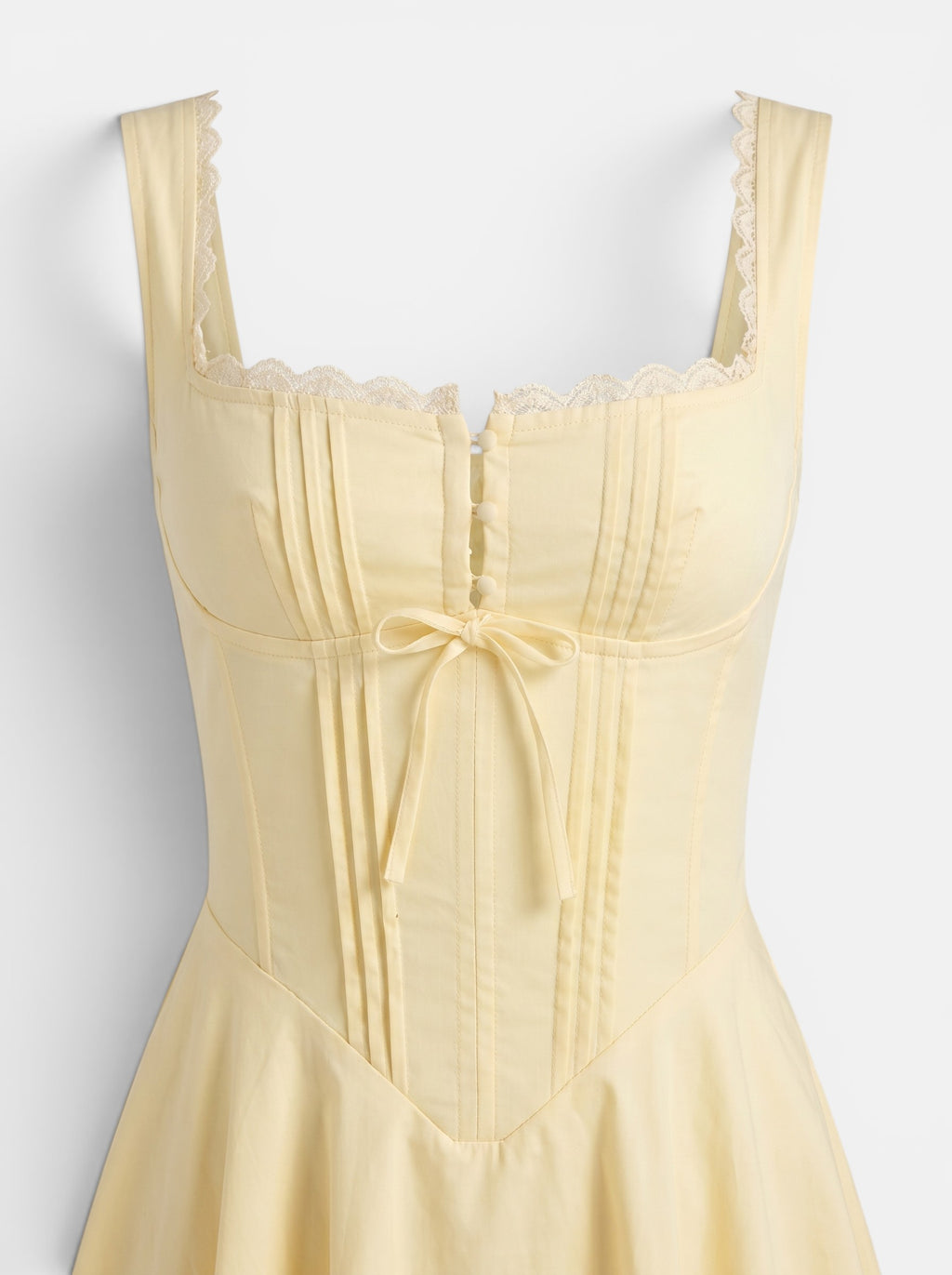 Venatte women's pale yellow A-line party dress with lace trim, pintuck detailing, and a tie-front bodice.