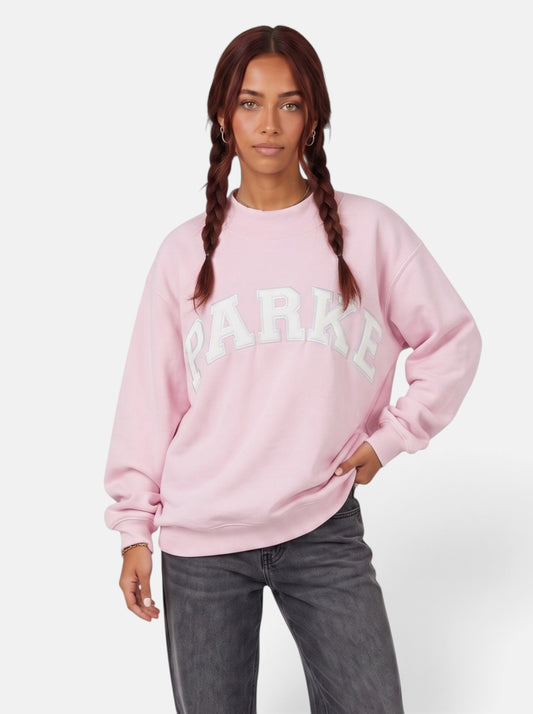 Women's purple oversized varsity sweatshirt hero shot